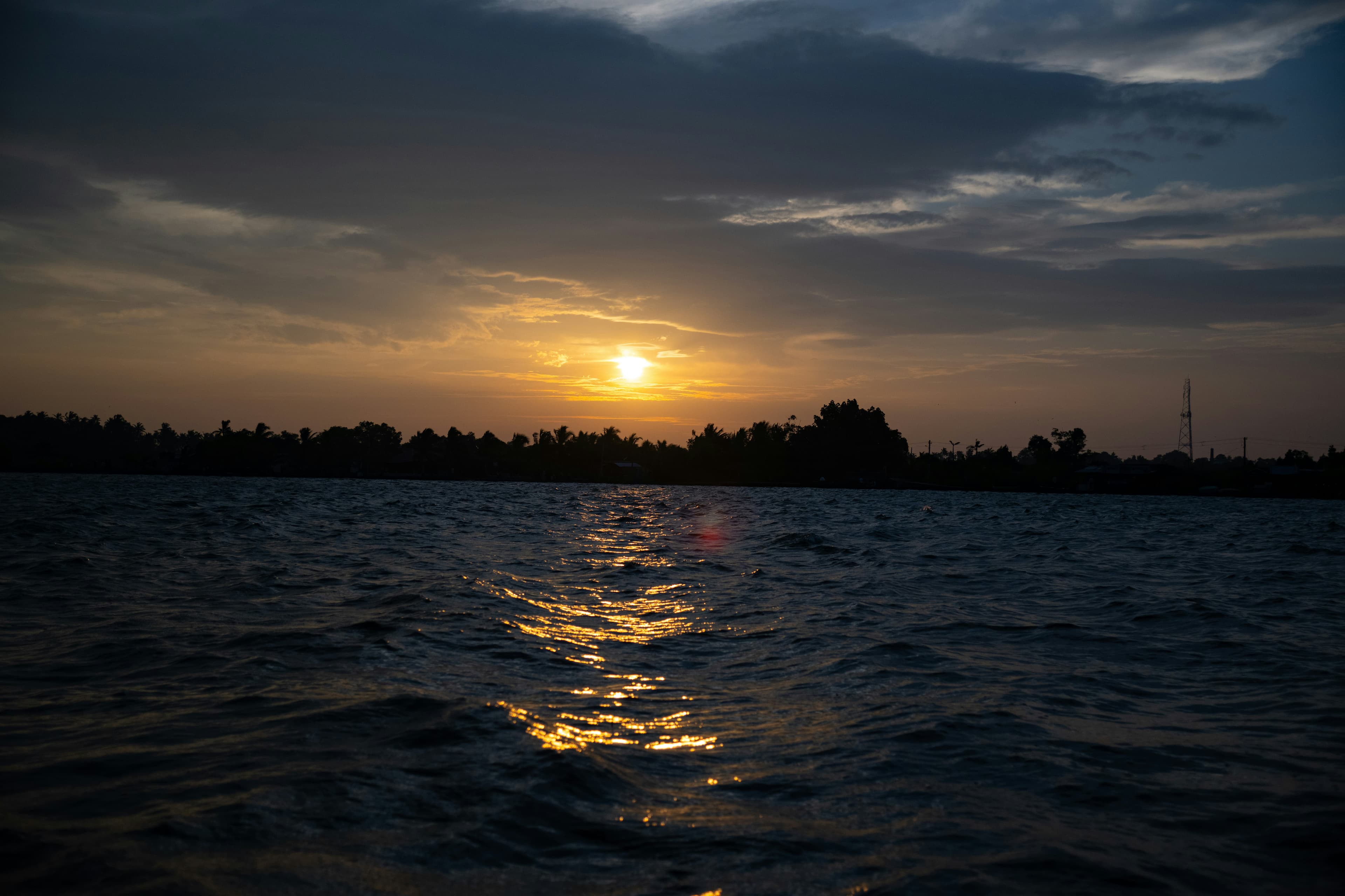 Sunset over the backwaters of Munroe Island
